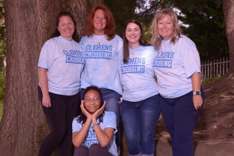 Photo of 5 Fourth Grade staff under a tree.